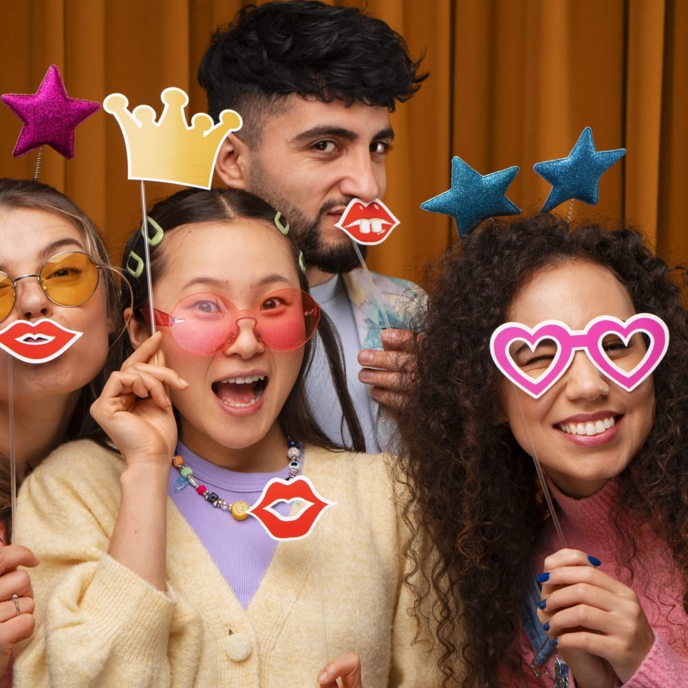 medium-shot-friends-posing-photo-booth